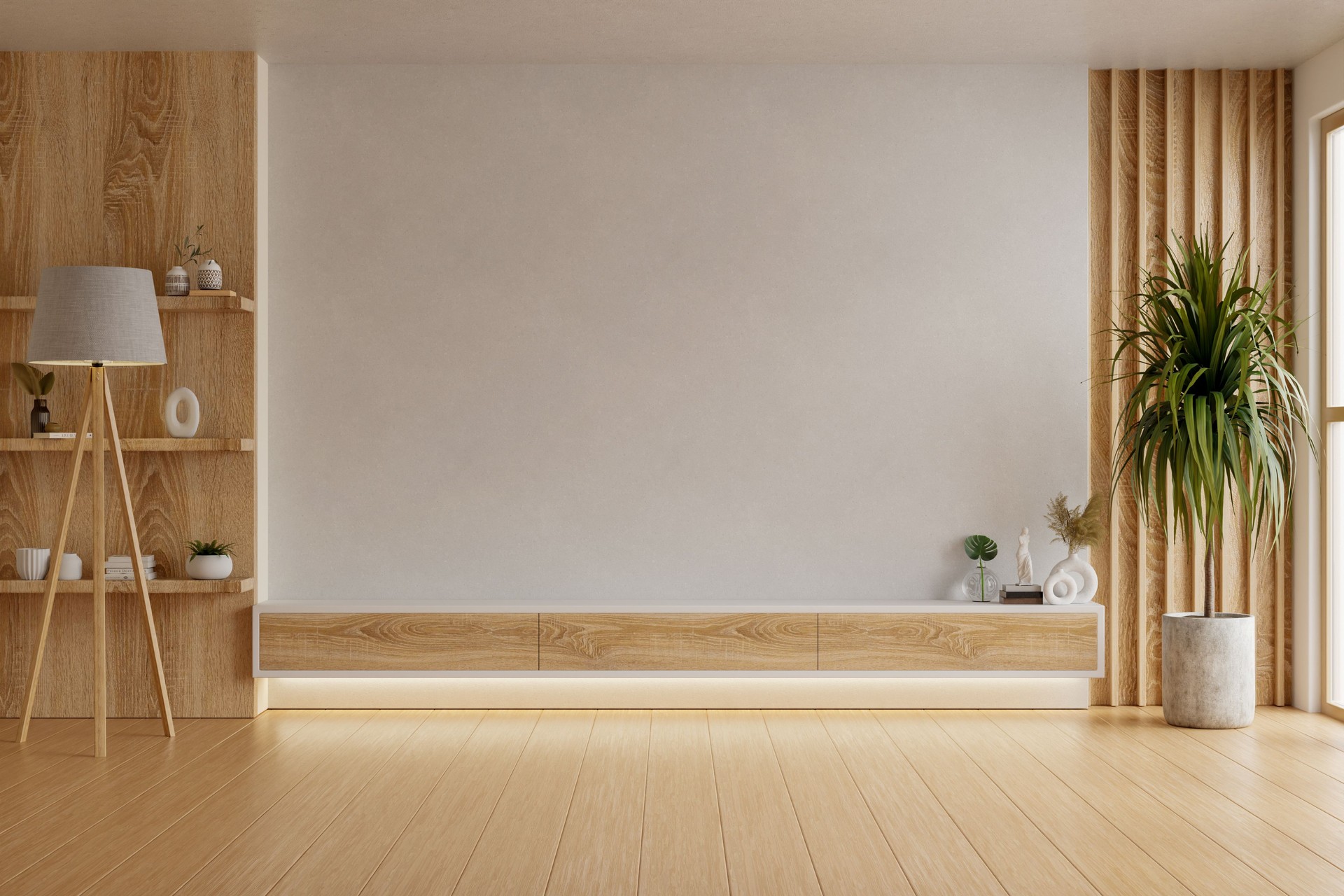 Modern minimal living room interior with a wooden TV wall unit, indoor plant, soft natural light, floor lamp, and decorative items on shelves- 3D rendering
